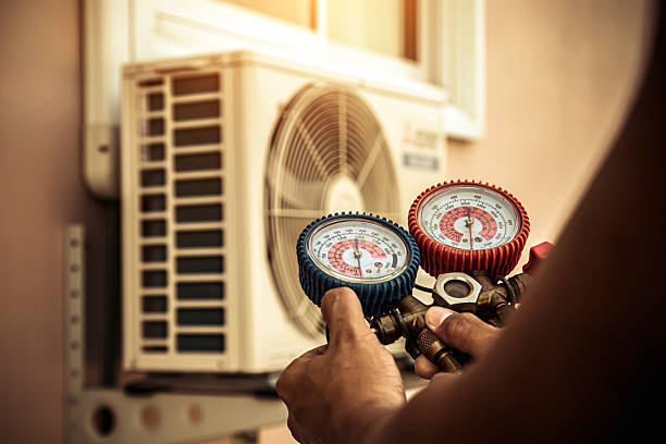 Professional Air Conditioning Service technician working in Hempstead, NY